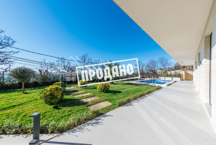 Коттедж с видом на море в стиле Райта №13