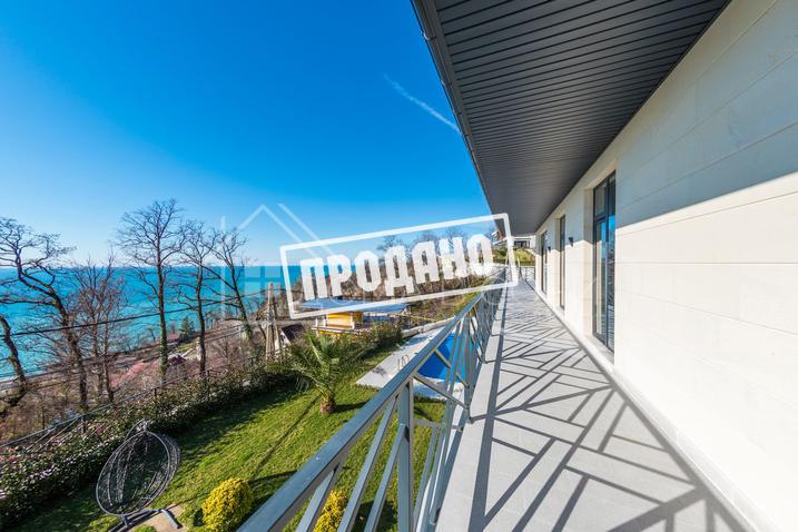 Коттедж с видом на море в стиле Райта №16