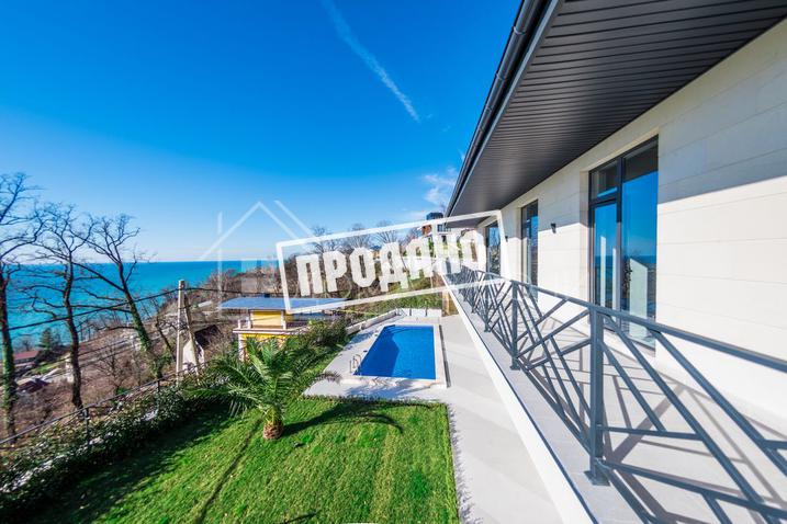 Коттедж с видом на море в стиле Райта №20