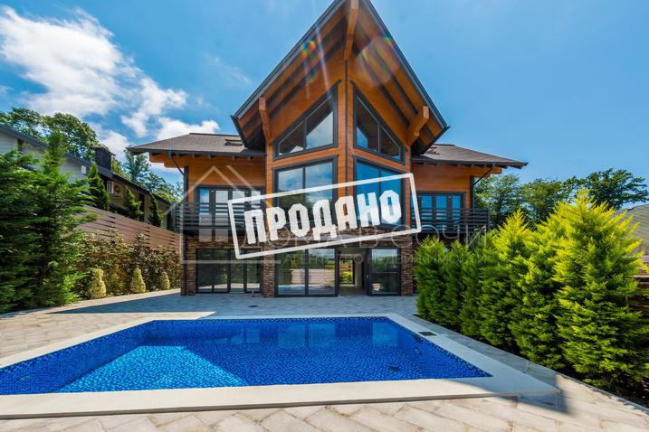 Дизайнерский коттедж на Ахуне №1
