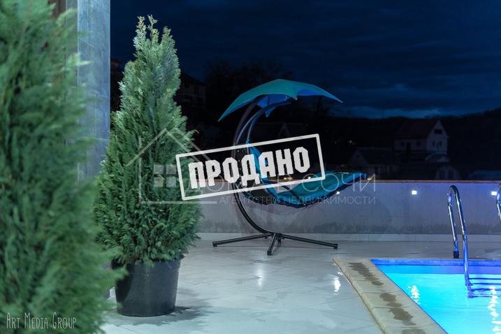 Дизайнерский коттедж в спальном микрорайоне №7