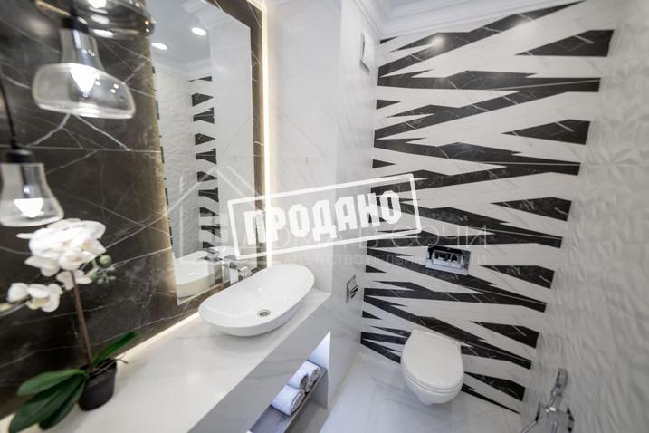 Дизайнерский коттедж в спальном микрорайоне №12