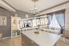 Красивый дом напротив парусного центра