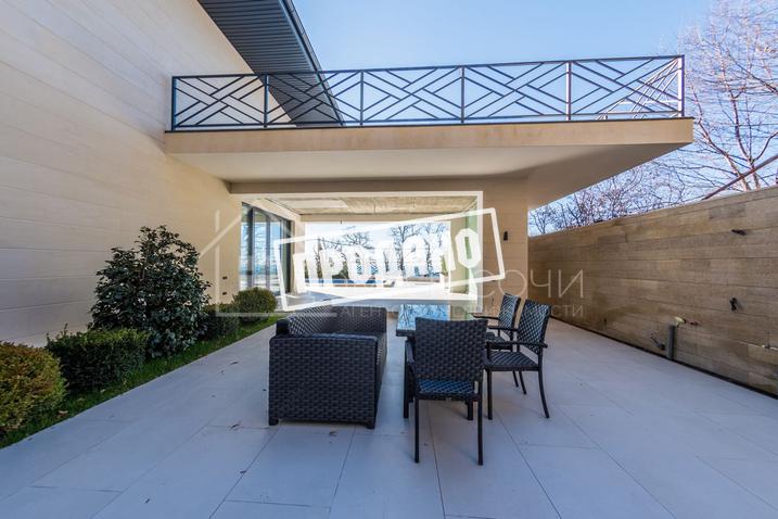 Коттедж с видом на море в стиле Райта №6