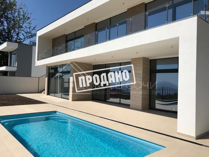 Дом с стиле хай-тек с панорамным видом на море №1