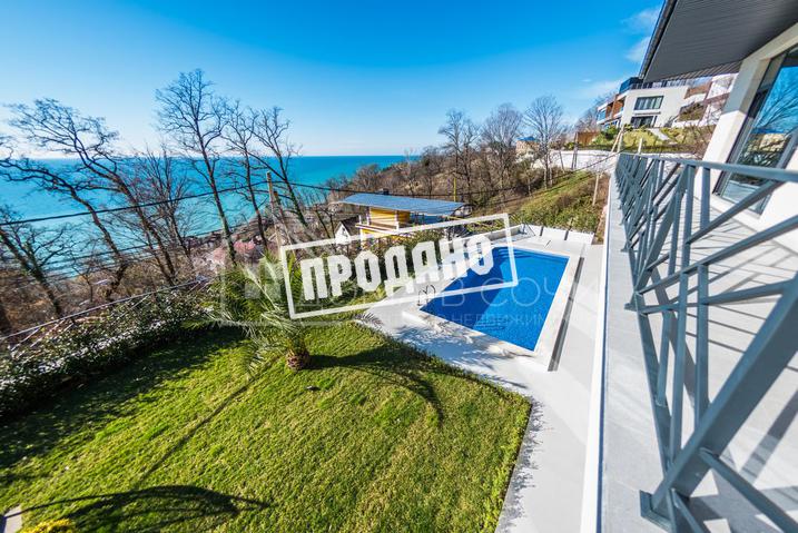 Коттедж с видом на море в стиле Райта №19