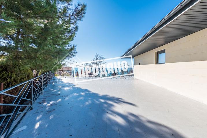 Коттедж с видом на море в стиле Райта №15