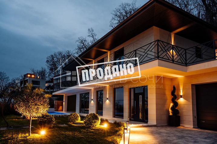 Коттедж с видом на море в стиле Райта №5