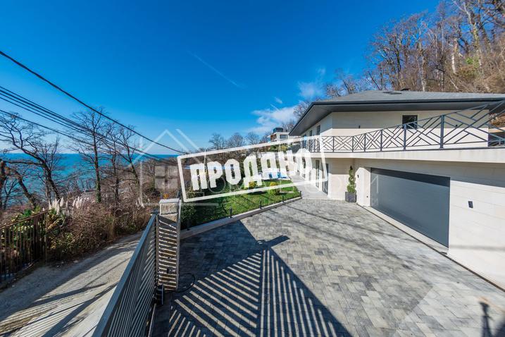 Коттедж с видом на море в стиле Райта №12